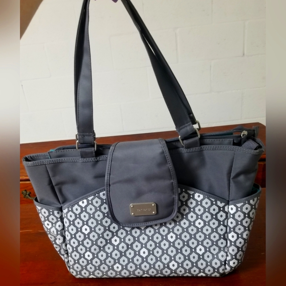 Brand new Carter's diaper bag with changing pad